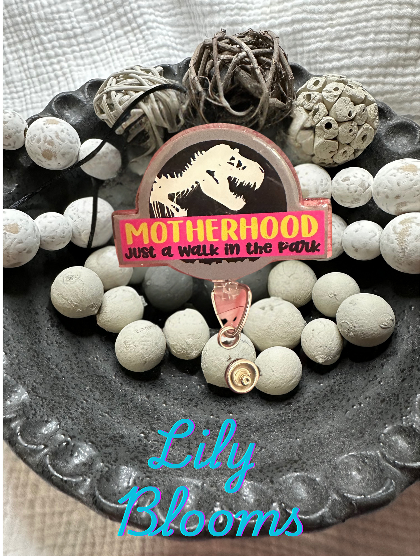 Motherhood Badge reel